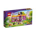 LEGO Friends: Friends Pet Adoption Café 41699 Building Kit; Birthday Gift Idea Comes with Olivia and Priyanka Mini-Dolls, 2 Dogs and 1 Cat Toy; For Kids Aged 6+ (292 Pieces) (41699) - New Sealed - box front