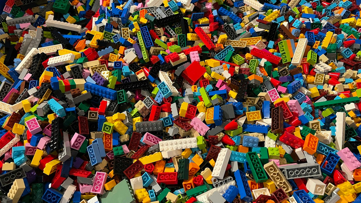 A big mixed pile of used LEGO bricks