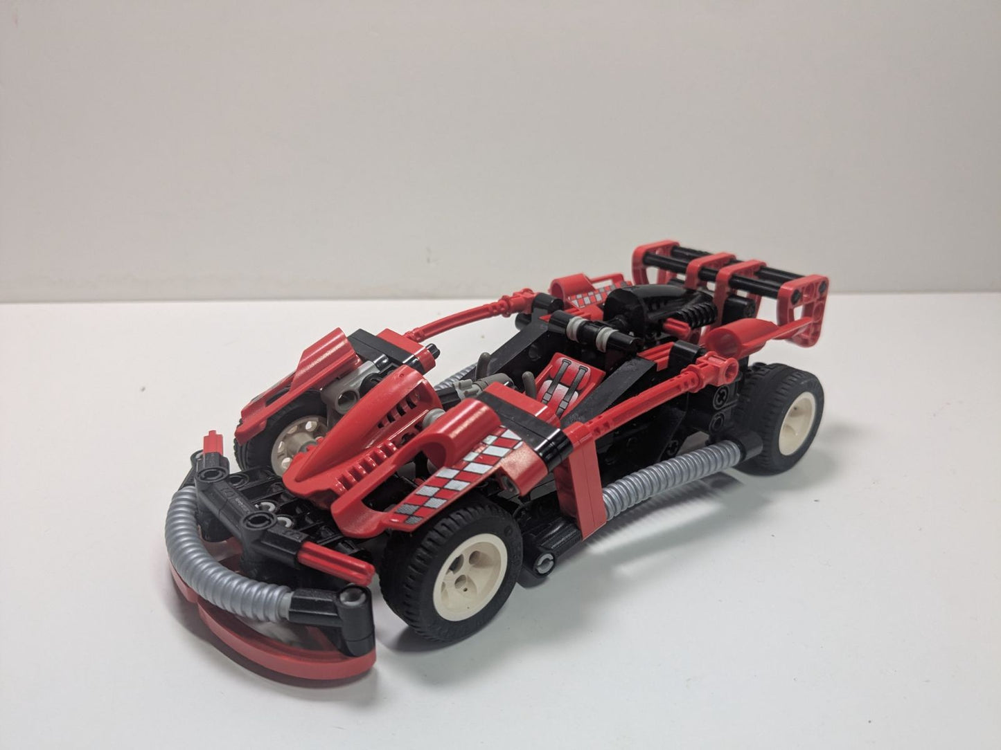 LEGO Technic: Slammer Turbo (8242) - Complete - minifigures